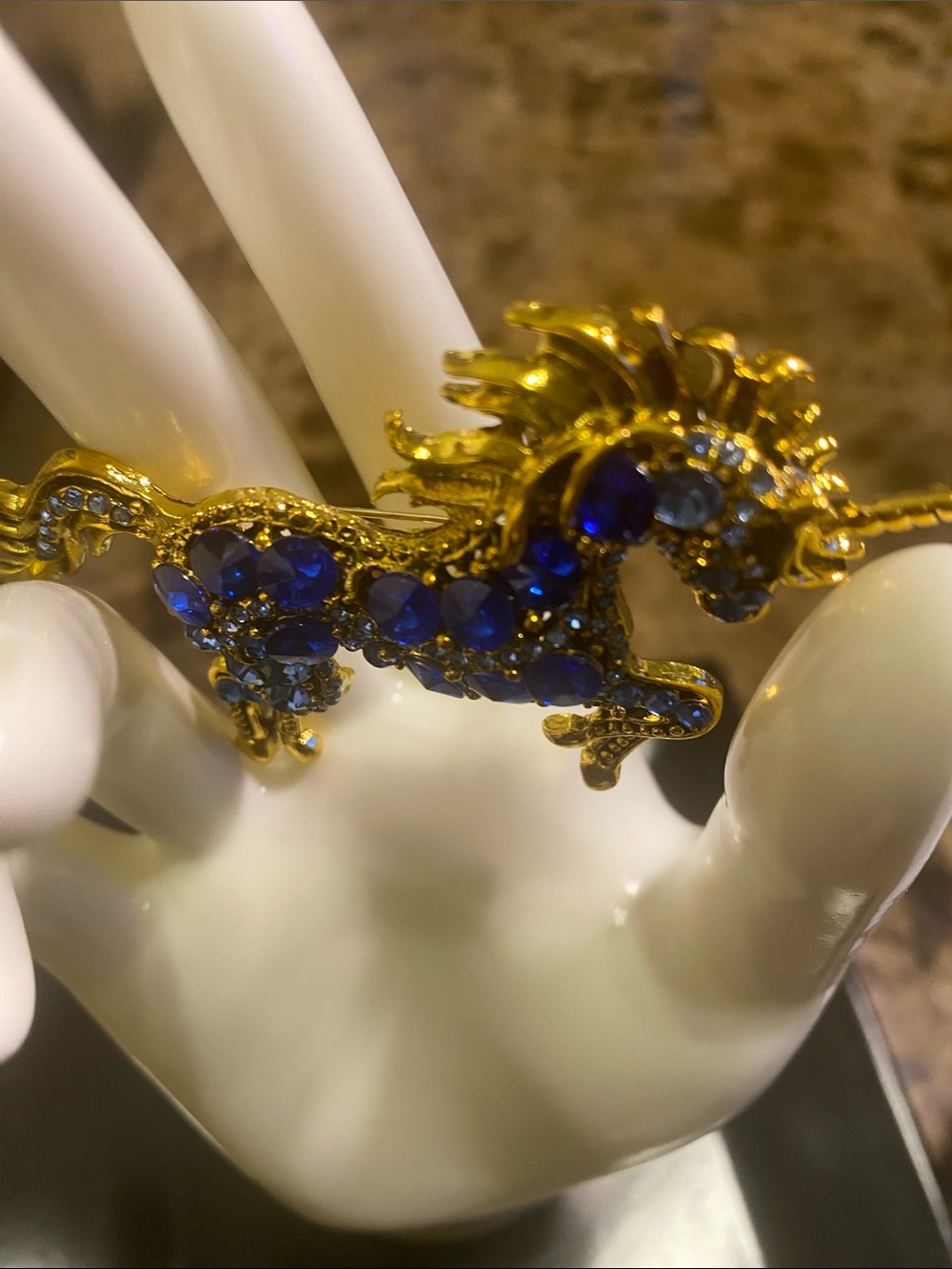 Gold-Tone Blue Rhinestone Horse Brooch